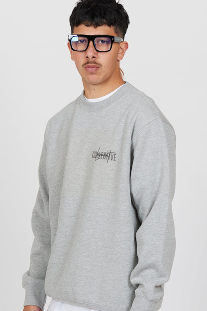 Close Front view of Male model wearing the Grey Marl Collective Crew Neck Top